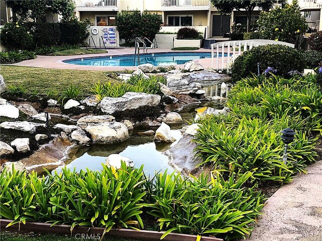 1200 Opal St Unit 22, Redondo Beach, CA 90277 - view of pool featuring a garden pond