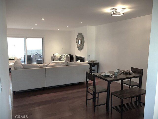 1200 Opal St Unit 22, Redondo Beach, CA 90277 - living room with dark wood-style flooring, recessed lighting, and a fireplace