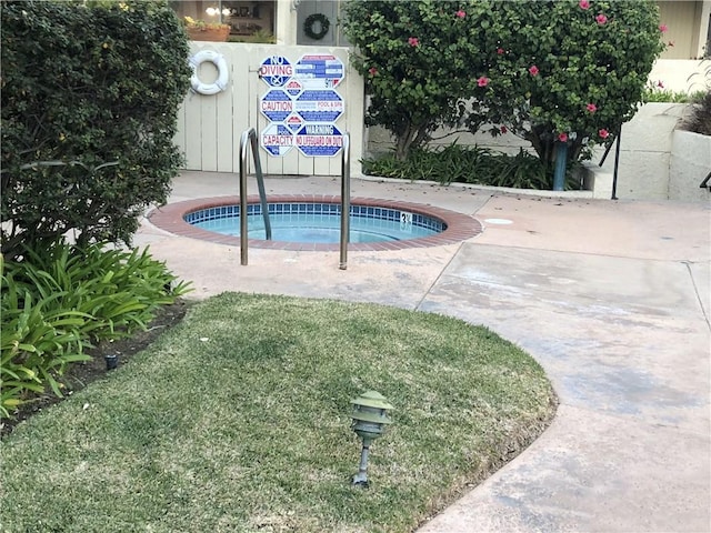 view of pool featuring a community hot tub