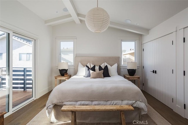 bedroom with access to exterior, dark hardwood / wood-style floors, and lofted ceiling with beams