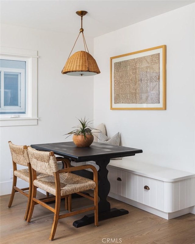 dining area with light wood-type flooring