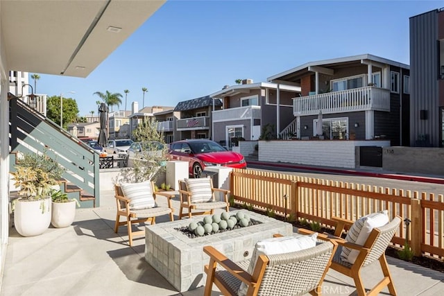 view of patio / terrace featuring an outdoor fire pit