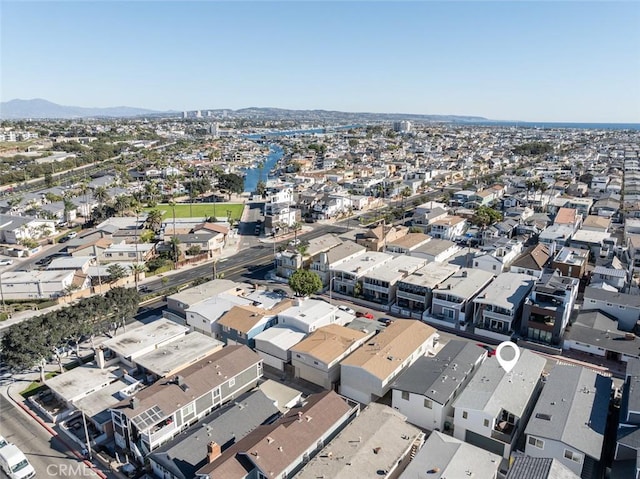 drone / aerial view featuring a mountain view