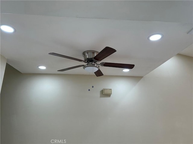 room details featuring a ceiling fan and recessed lighting