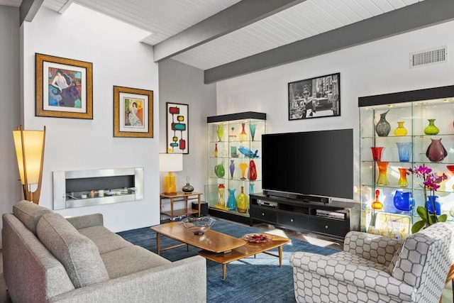 living room with wood ceiling, a fireplace, and beamed ceiling