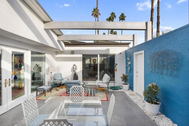 view of patio featuring french doors