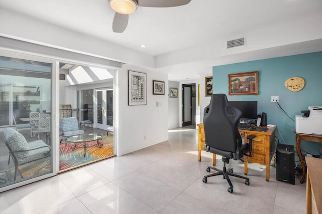 tiled home office with ceiling fan