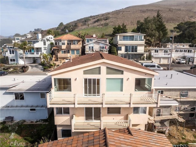 view of building exterior with a mountain view