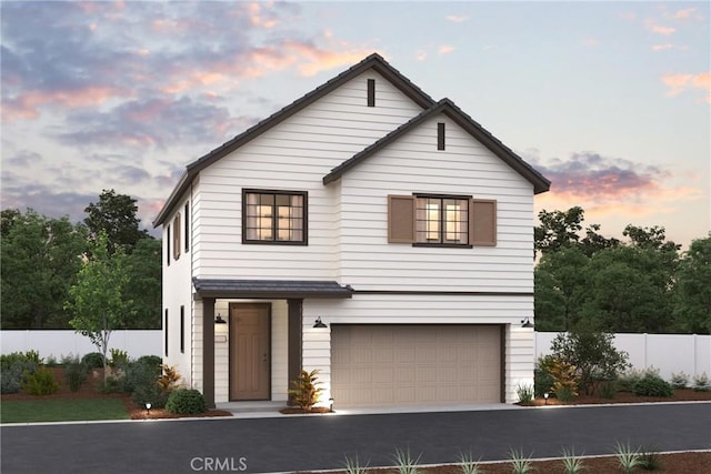 view of front of home with a garage