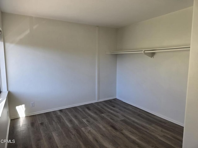 interior space with dark hardwood / wood-style flooring