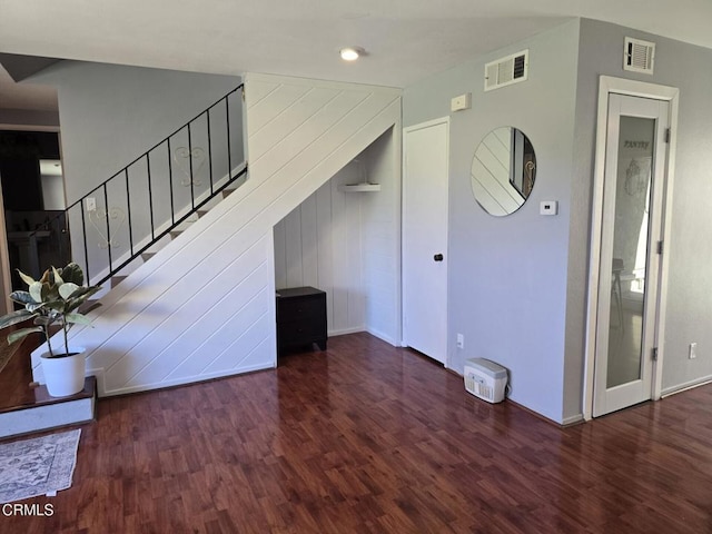 interior space with dark wood-type flooring