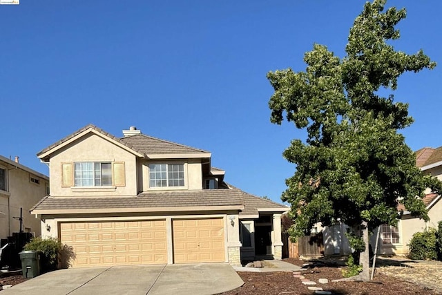 view of front property with a garage