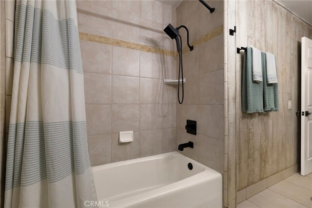 bathroom featuring tile patterned floors and shower / bath combination with curtain