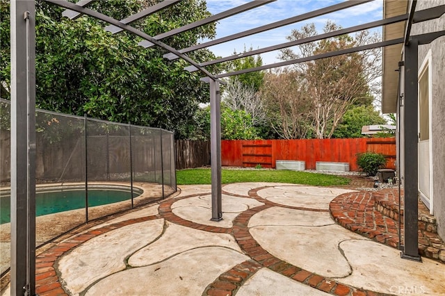 view of patio featuring a fenced in pool and a pergola