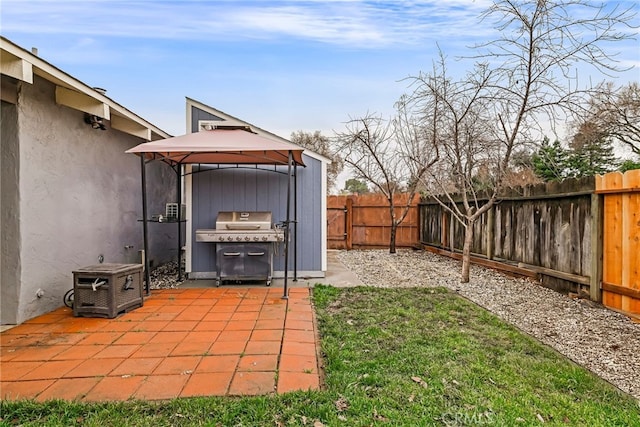 view of yard featuring a gazebo and a patio area