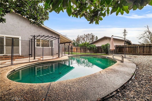 view of pool featuring a pergola and a patio