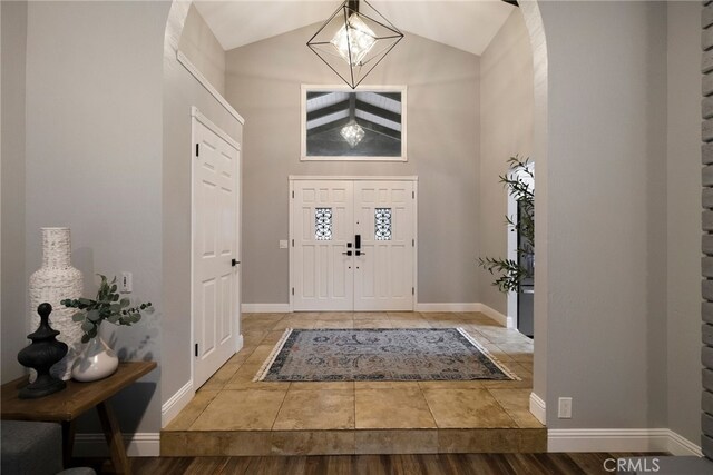 foyer with vaulted ceiling