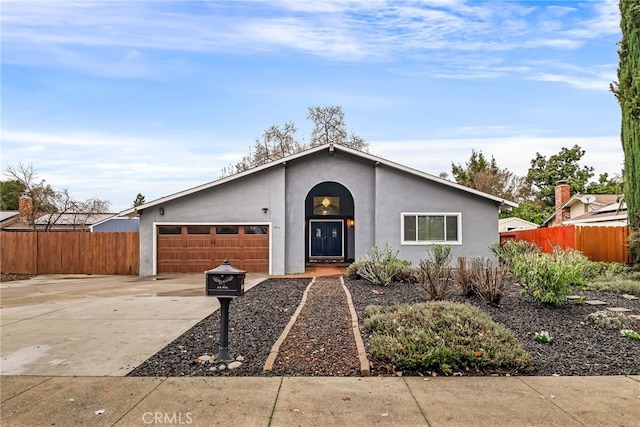 ranch-style home with a garage