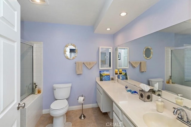 full bathroom with tile patterned flooring, toilet, vanity, and shower with separate bathtub