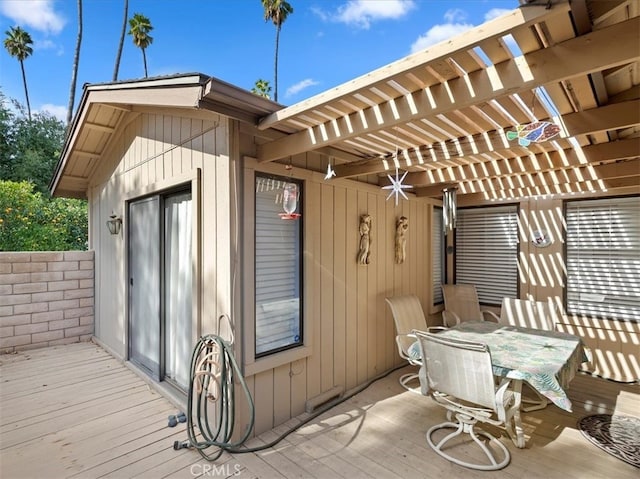 exterior space featuring a deck and a pergola