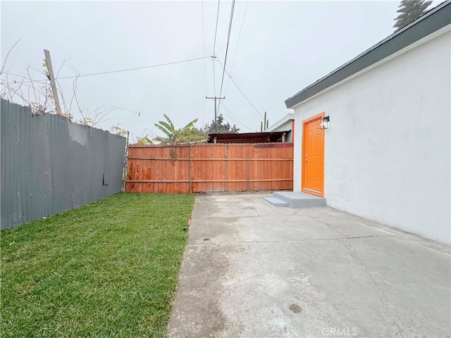 view of yard with a patio area