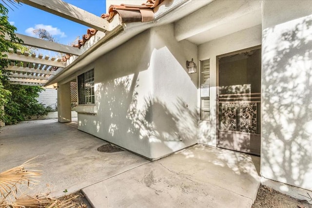 view of home's exterior with a patio area