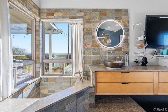 full bath featuring vanity