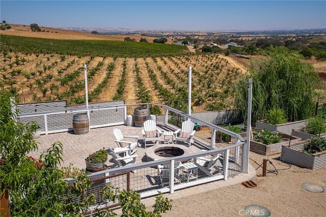 birds eye view of property with a rural view