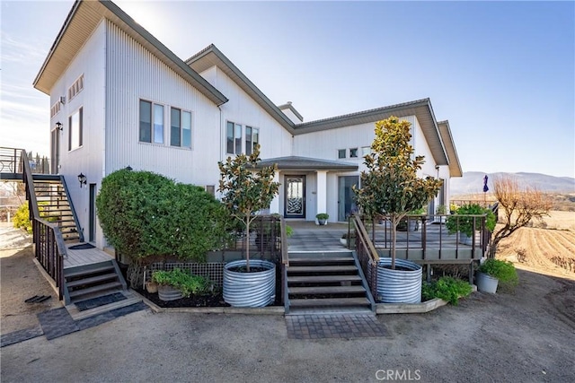 view of front of home featuring stairway