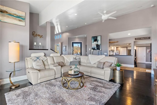 living room featuring recessed lighting, baseboards, ceiling fan, and wood finished floors
