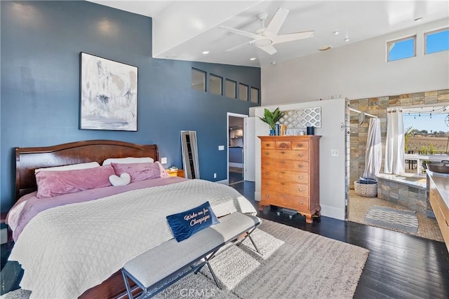 bedroom featuring ceiling fan, high vaulted ceiling, dark hardwood / wood-style flooring, a spacious closet, and access to outside