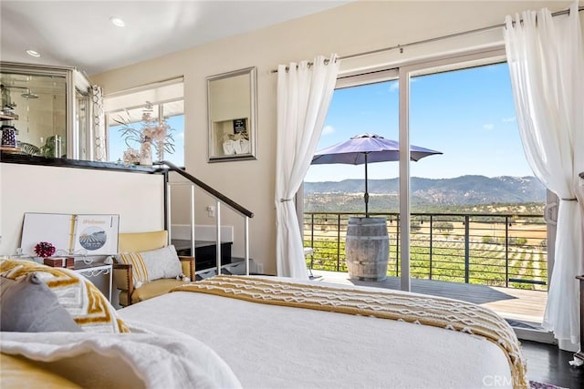 bedroom featuring a mountain view