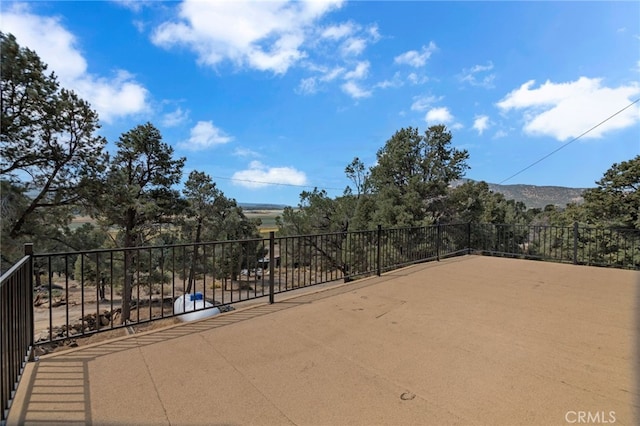 view of patio with a mountain view