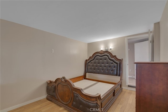 bedroom featuring light wood-type flooring