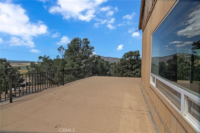 view of patio featuring a mountain view