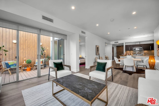 living room featuring light wood-type flooring