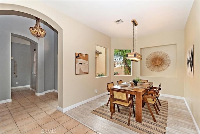 dining space featuring light hardwood / wood-style flooring