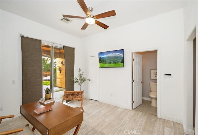 interior space featuring light hardwood / wood-style floors and ceiling fan