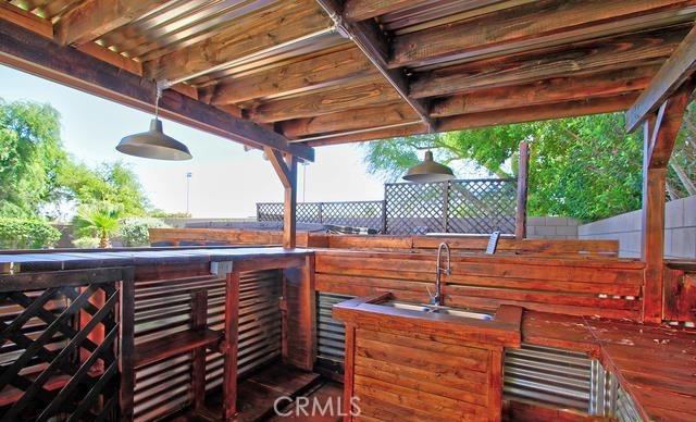 view of patio / terrace with a wet bar