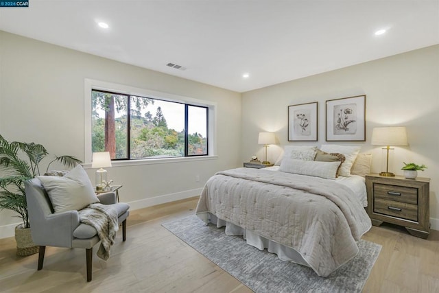 bedroom with light hardwood / wood-style flooring