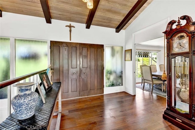 entrance foyer featuring beam ceiling, wood ceiling, dark hardwood / wood-style flooring, and high vaulted ceiling