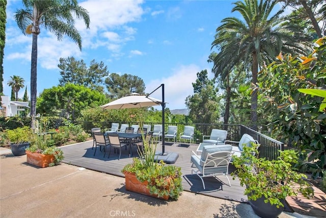 view of patio featuring an outdoor living space and a deck