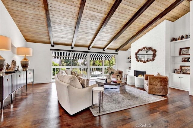 living room with beam ceiling, a fireplace, and wooden ceiling