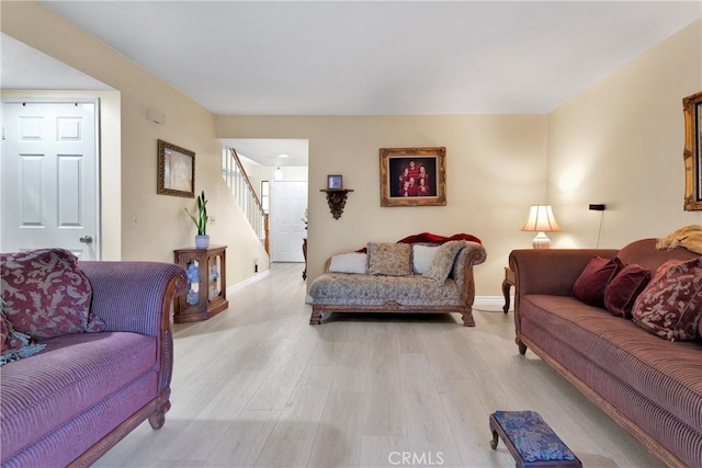 living room with light hardwood / wood-style floors