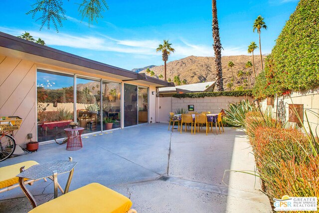 view of patio with a mountain view