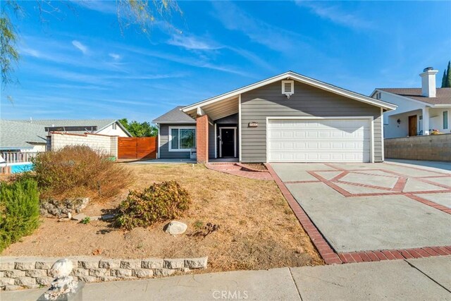 single story home with a garage