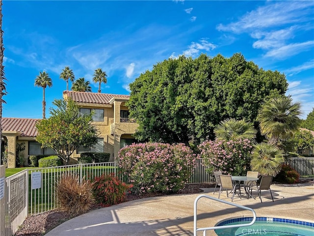 view of pool featuring a patio area