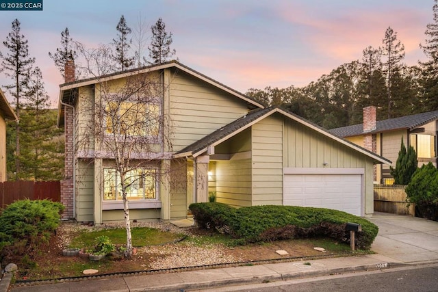 view of front of property with a garage