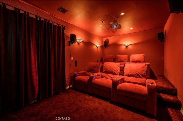 cinema room with dark colored carpet