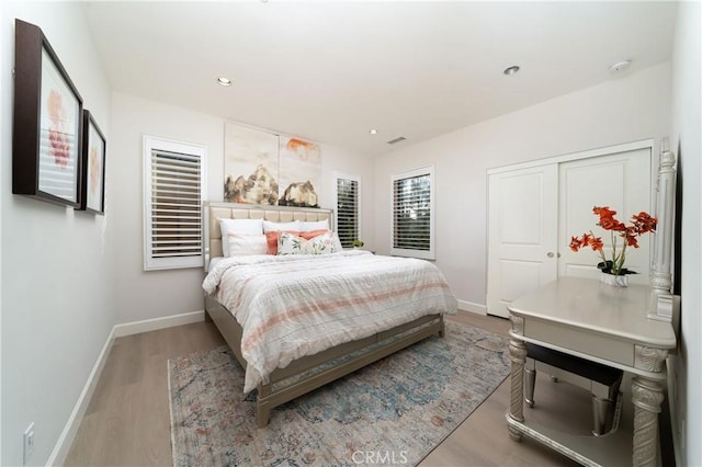 bedroom featuring light wood-type flooring